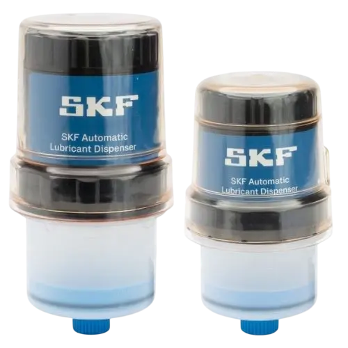 Refillable automatic grease dispensers